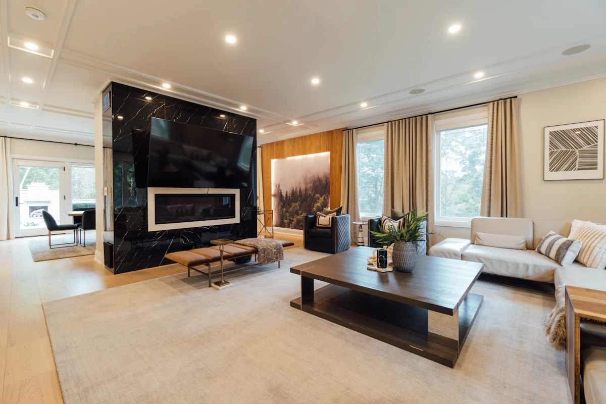 Living room with curtains mounted close to the ceiling to create a taller vertical line