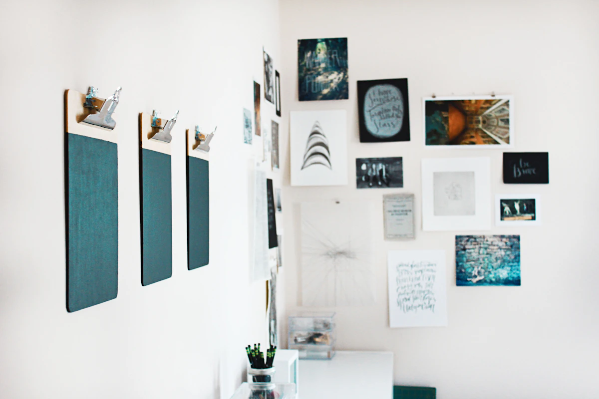 Home office with patterned wallpaper creating a defined work zone