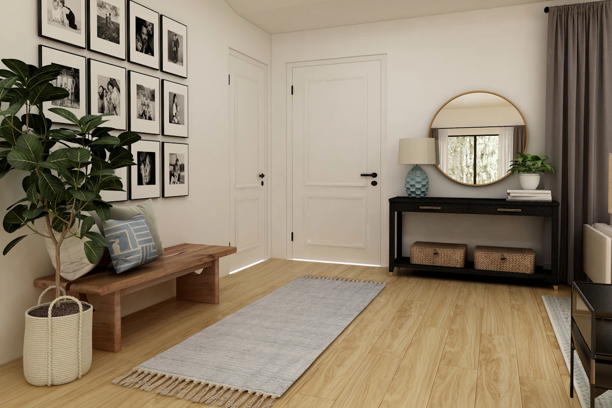 Warm entryway console styled with natural wood, neutral decor, and seasonal branches
