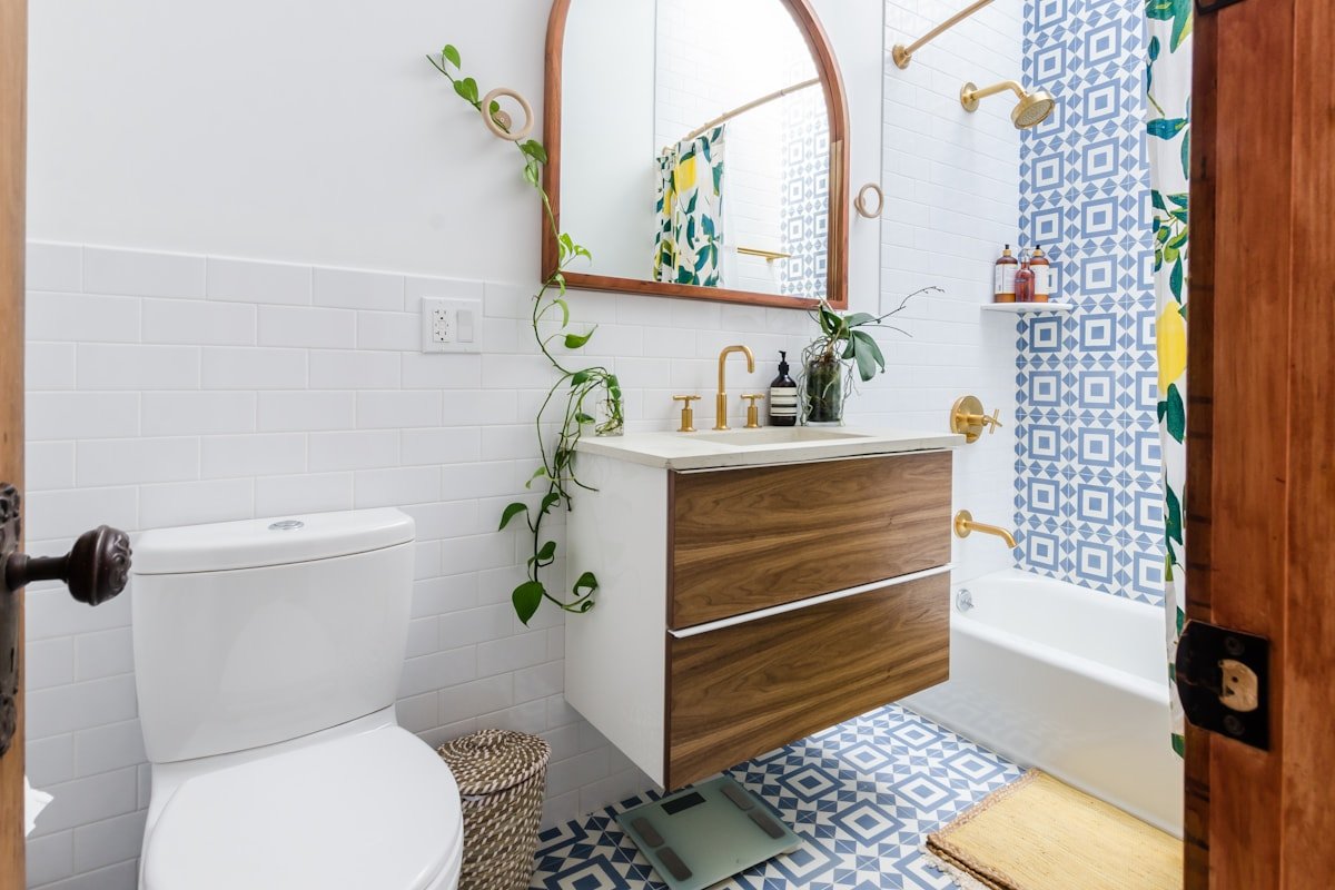 Compact bathroom with white fixtures and clean renter-friendly styling