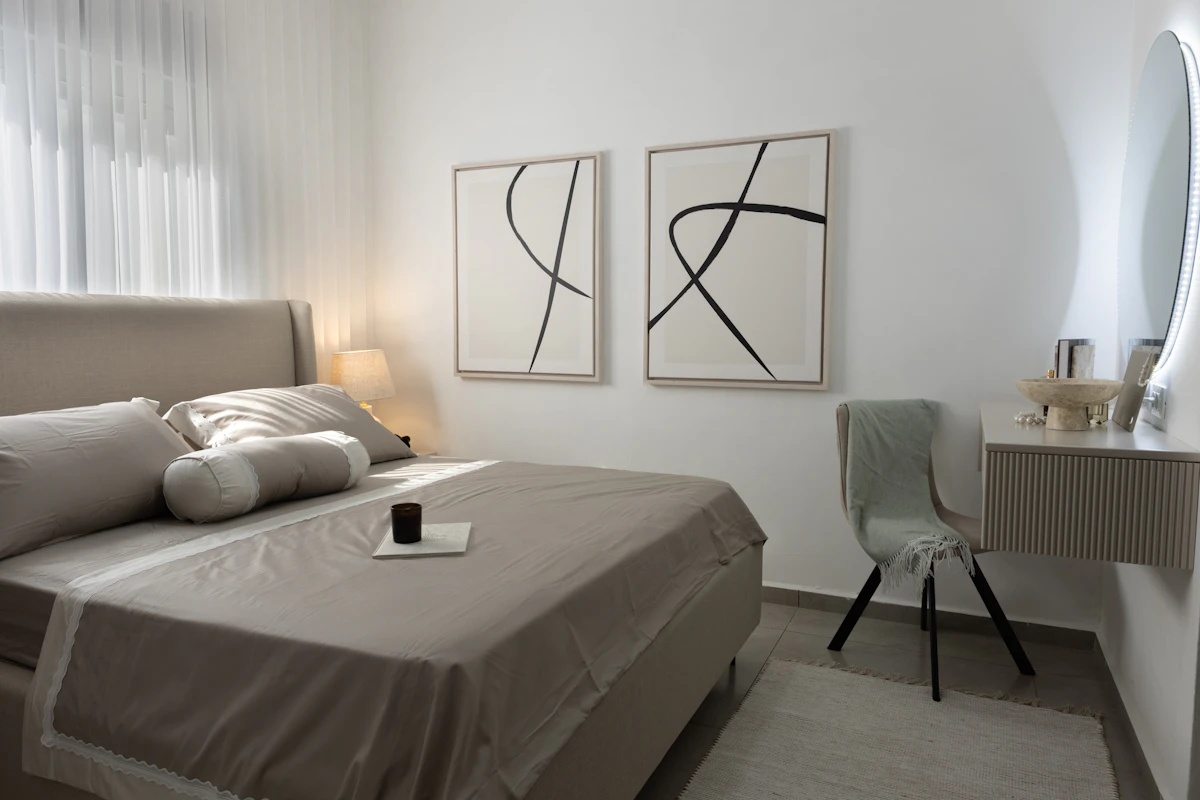 Modern bedroom with a vanity and coordinated wall decor
