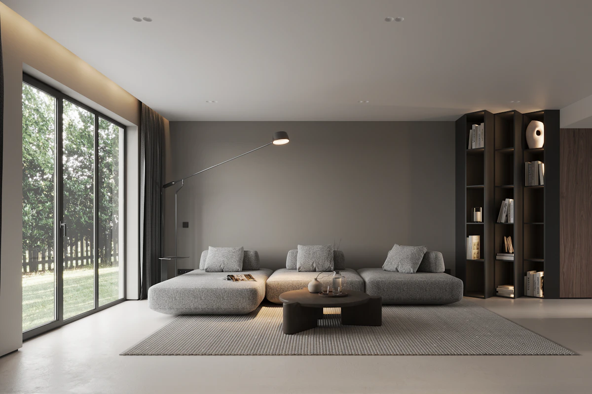 Modern living room with sectional sofa and large area rug anchoring the seating group